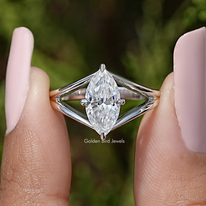 Marquise moissanite center stone with split-shank prongs on 925 sterling silver ring
