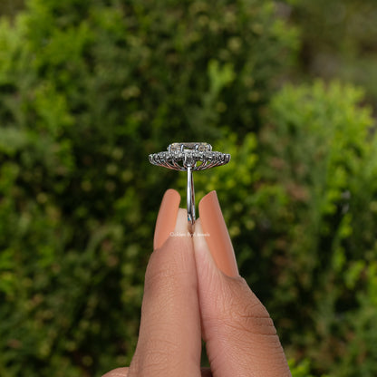 Oval moissanite halo ring in sterling silver, top view of prong-set halo