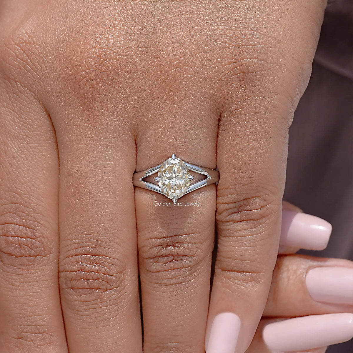 Oval moissanite split-shank engagement ring in 925 sterling silver, front view