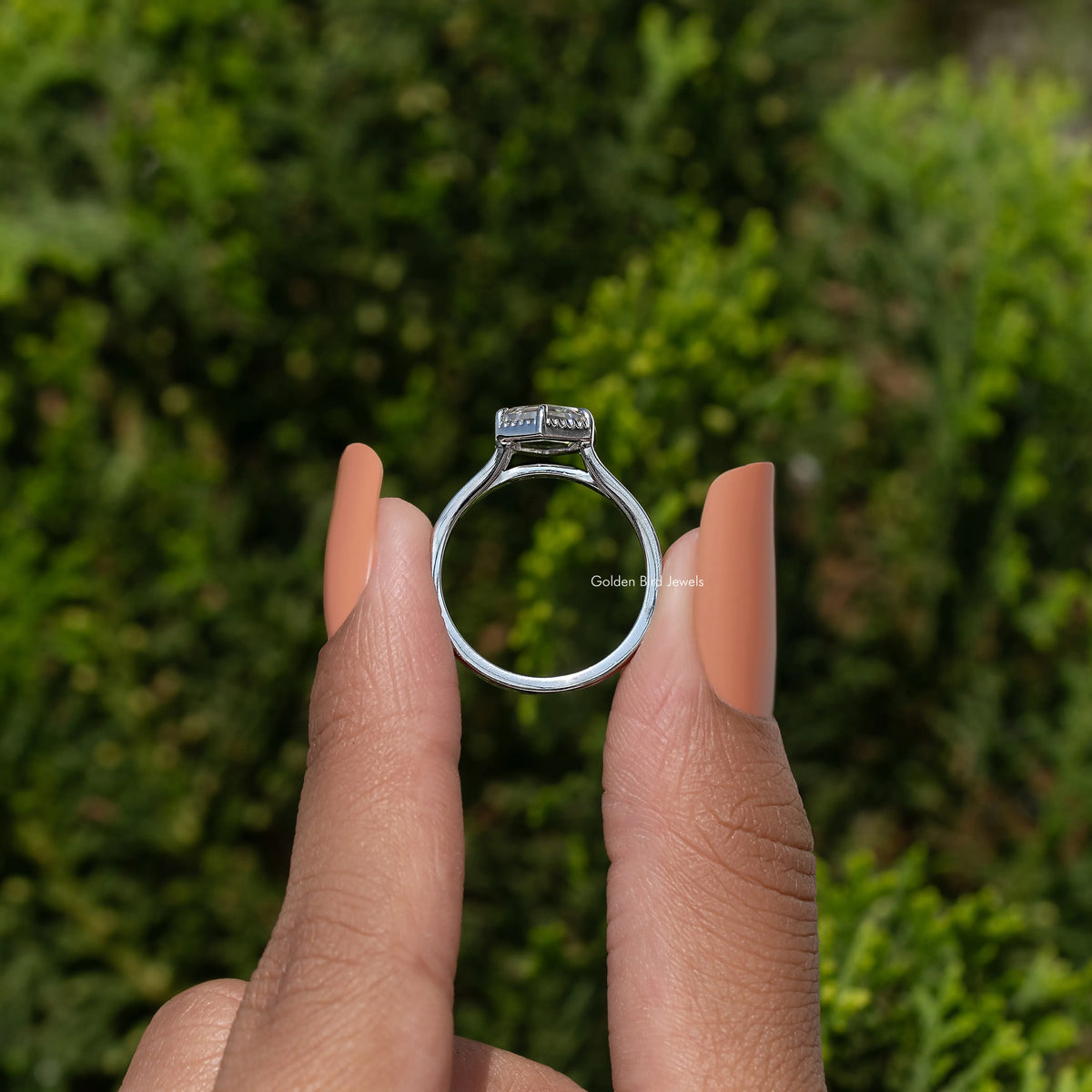 Hexagon-cut moissanite ring, open side view with prong-set center stone