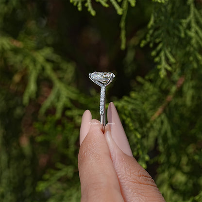 Sterling silver ring with pear-cut solitaire moissanite and slim prong setting