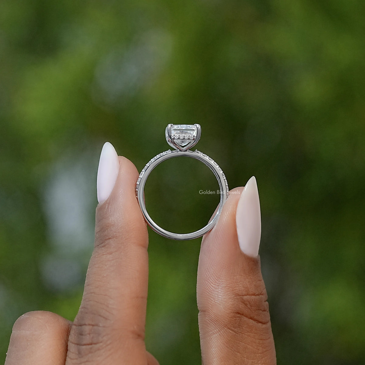 Radiant cut moissanite solitaire ring back view, prong setting on silver band