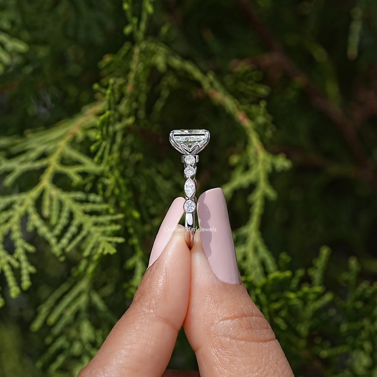 Radiant cut moissanite engagement ring with square center stone and slim prong setting