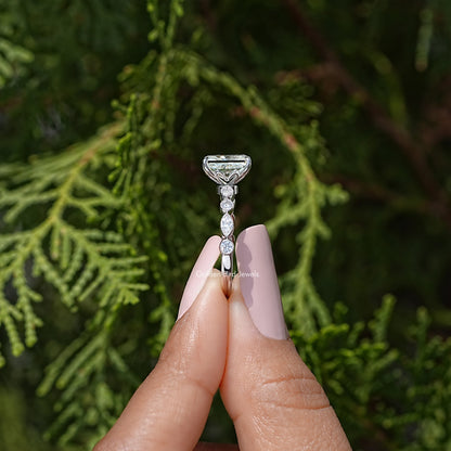 Radiant cut moissanite engagement ring with square center stone and slim prong setting