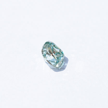 Light blue moissanite gemstone, cushion old mine cut, angled view