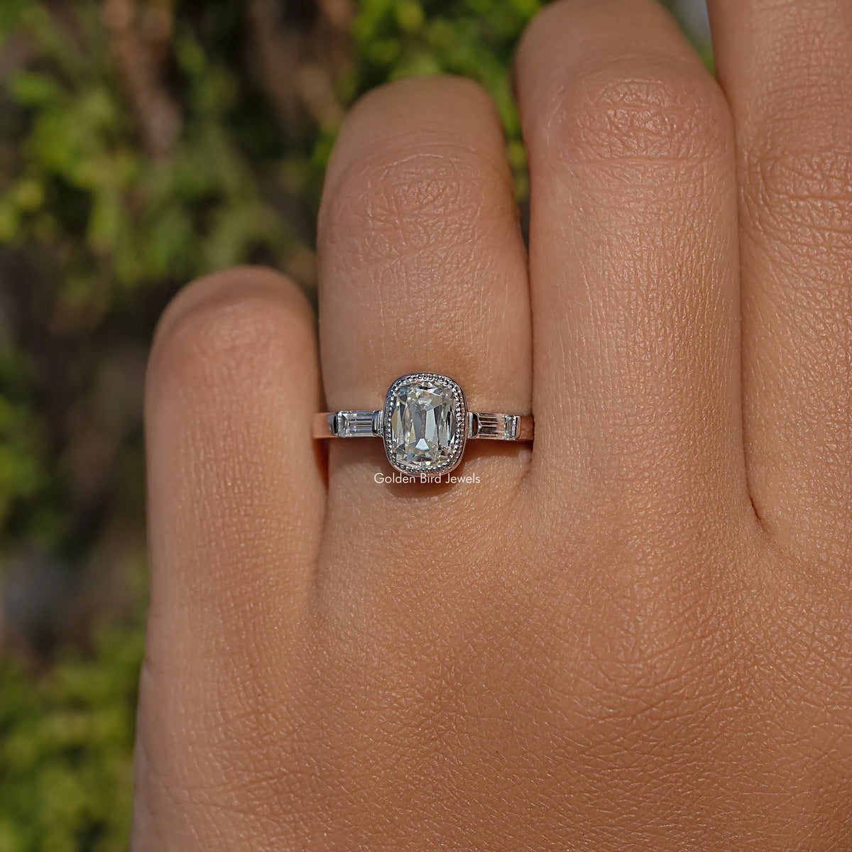 Elongated cushion moissanite ring with baguette-cut side stones in sterling silver