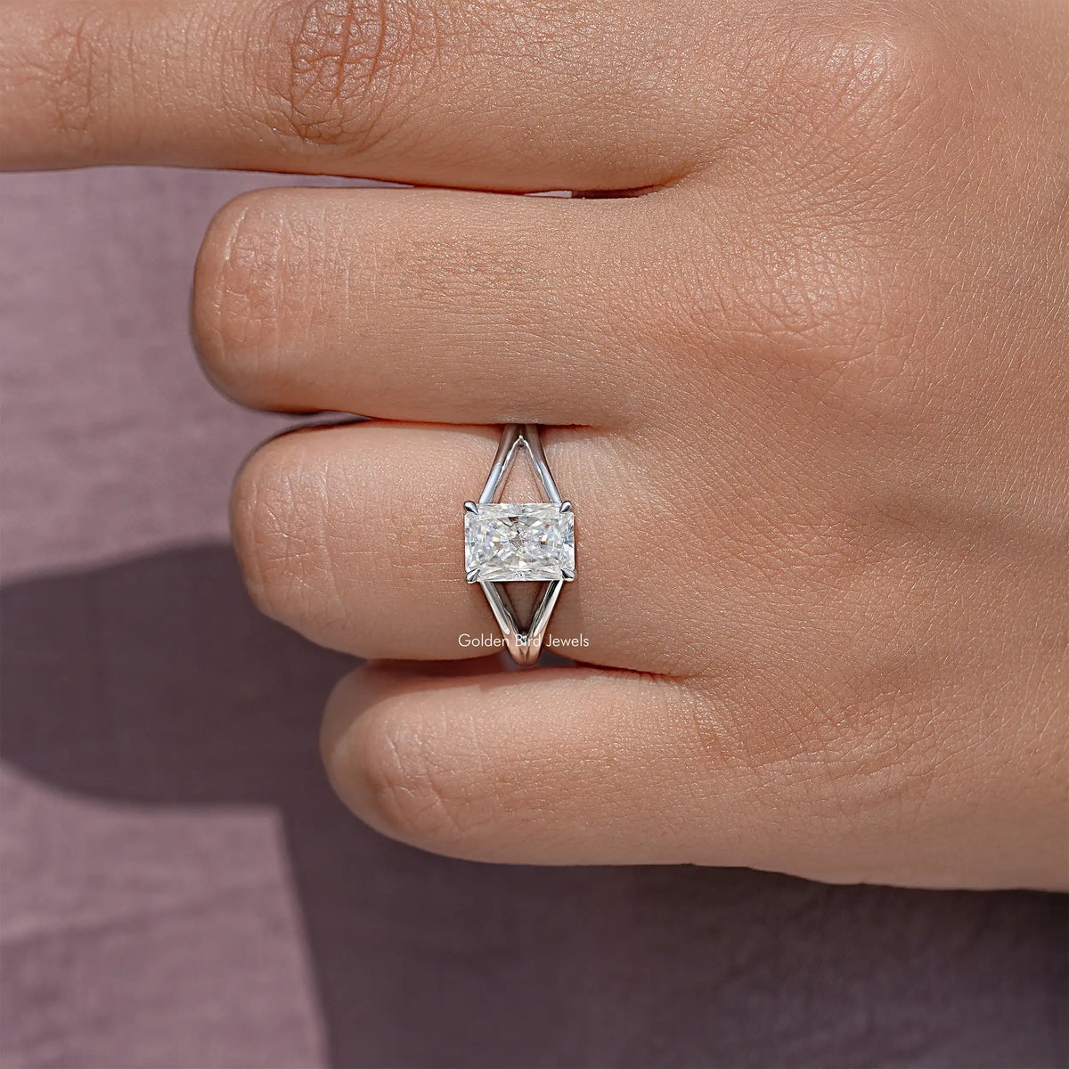Sterling silver split-shank ring with radiant cut square moissanite center