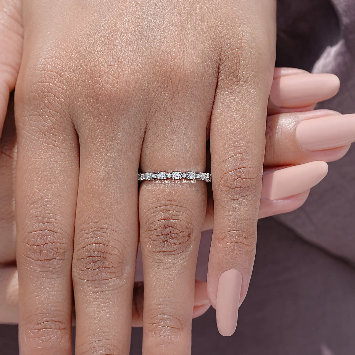 Silver full eternity wedding band with round moissanite stones on two fingers