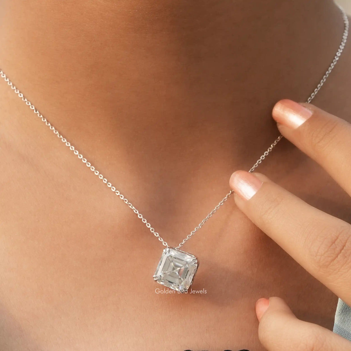 Close view of moissanite chain bracelet in secure setting 