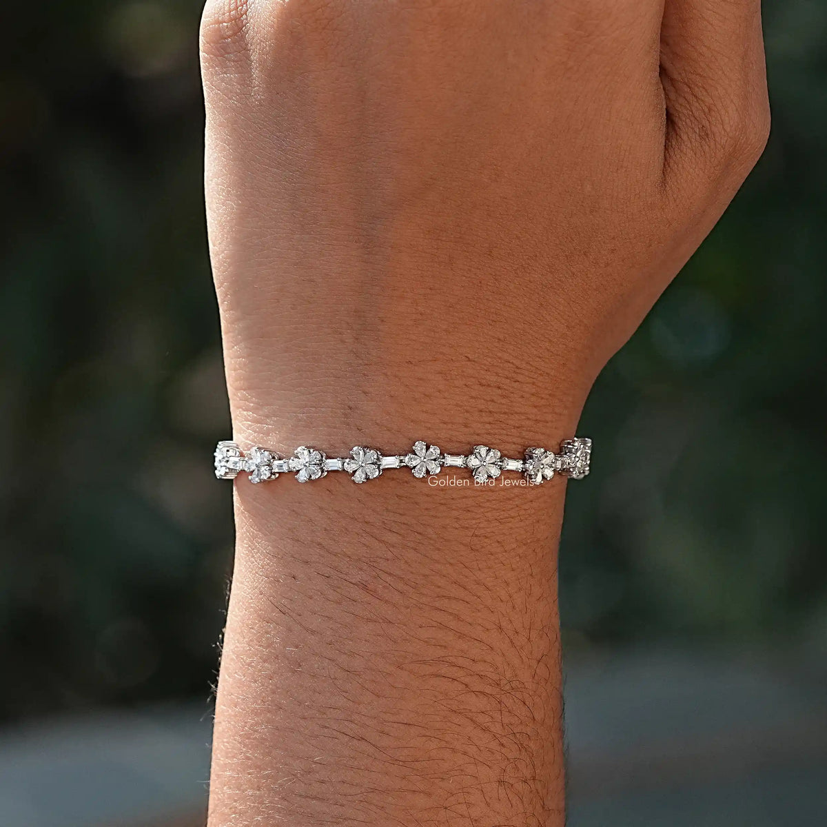 Pear and baguette Shaped bracelet with secure setting 