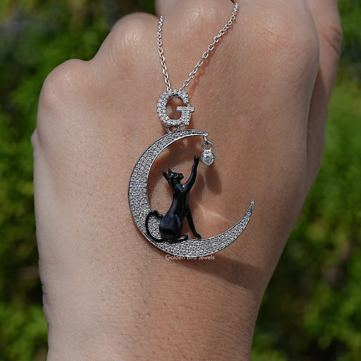 hand Showing View of Round Shaped Moissanite Pendant
