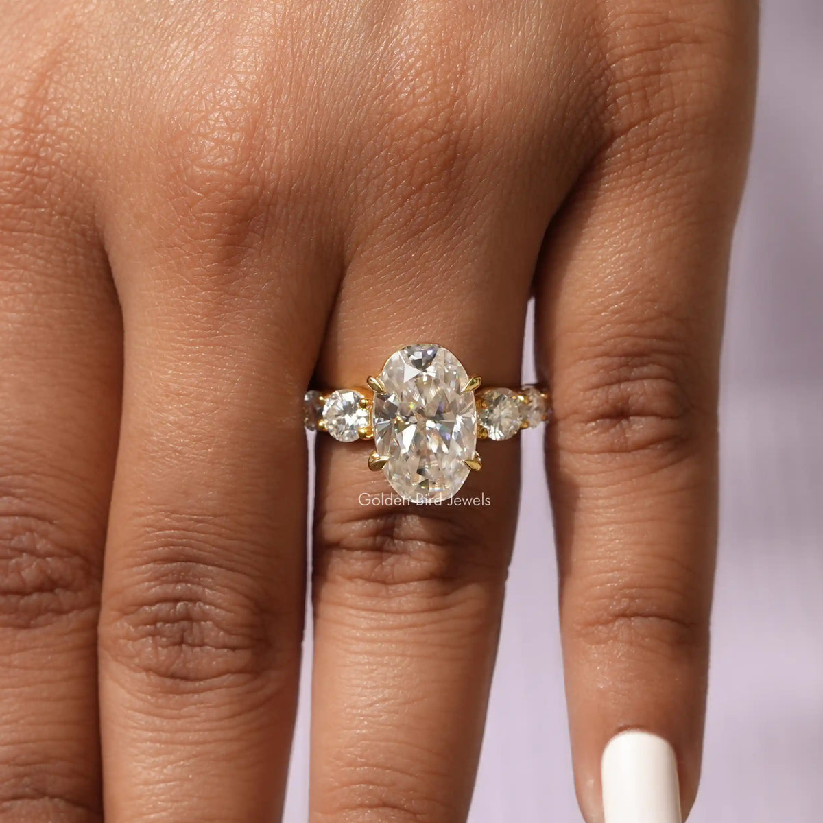 Oval And Round Cut Moissanite Ring In finger