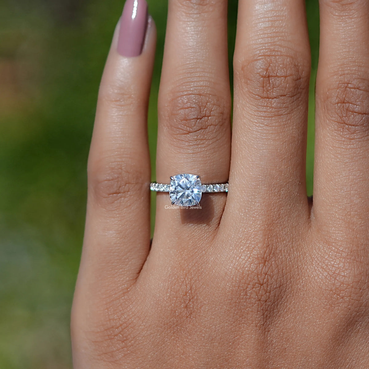 In finger view of Cushion Cut Moissanite Solitaire Ring