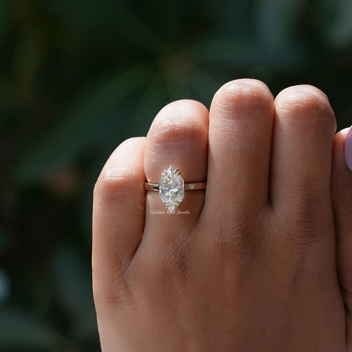 View of Dutch Marquise Hidden Halo Engagement Ring In Finger 