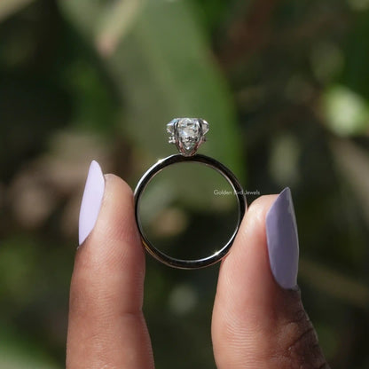 Back View of Marquise Cut Hidden Halo Ring In two fingers