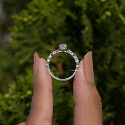 Sterling silver marquise moissanite ring with a central elongated stone and side accents