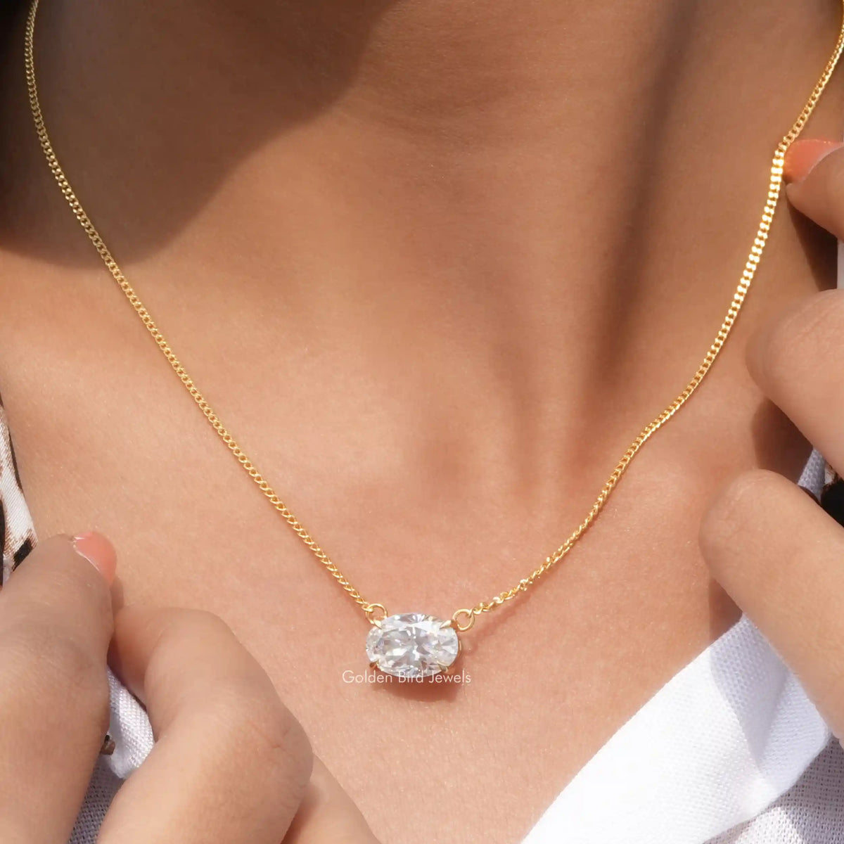 Detailed view of moissanite ice oval shape pendant