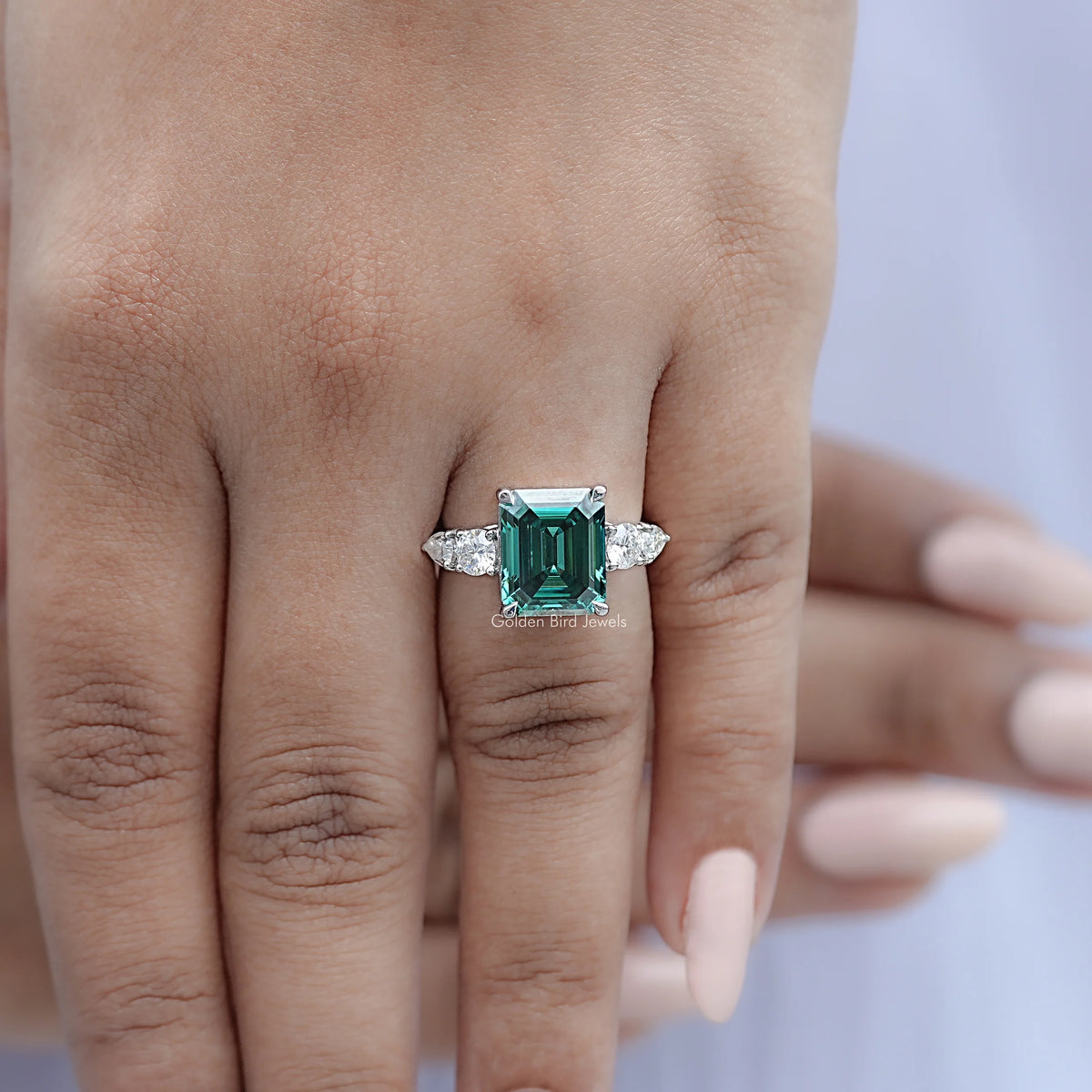 Five-stone emerald-cut green ring in 925 silver with two side stones each side