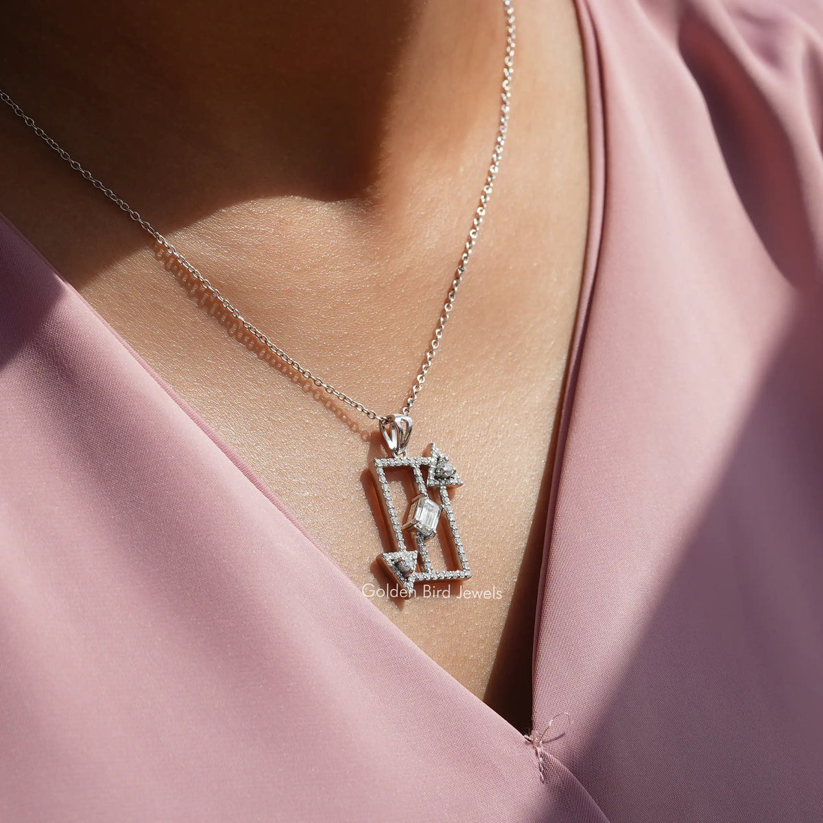 In neck front view of moissanite emerald cut pendant