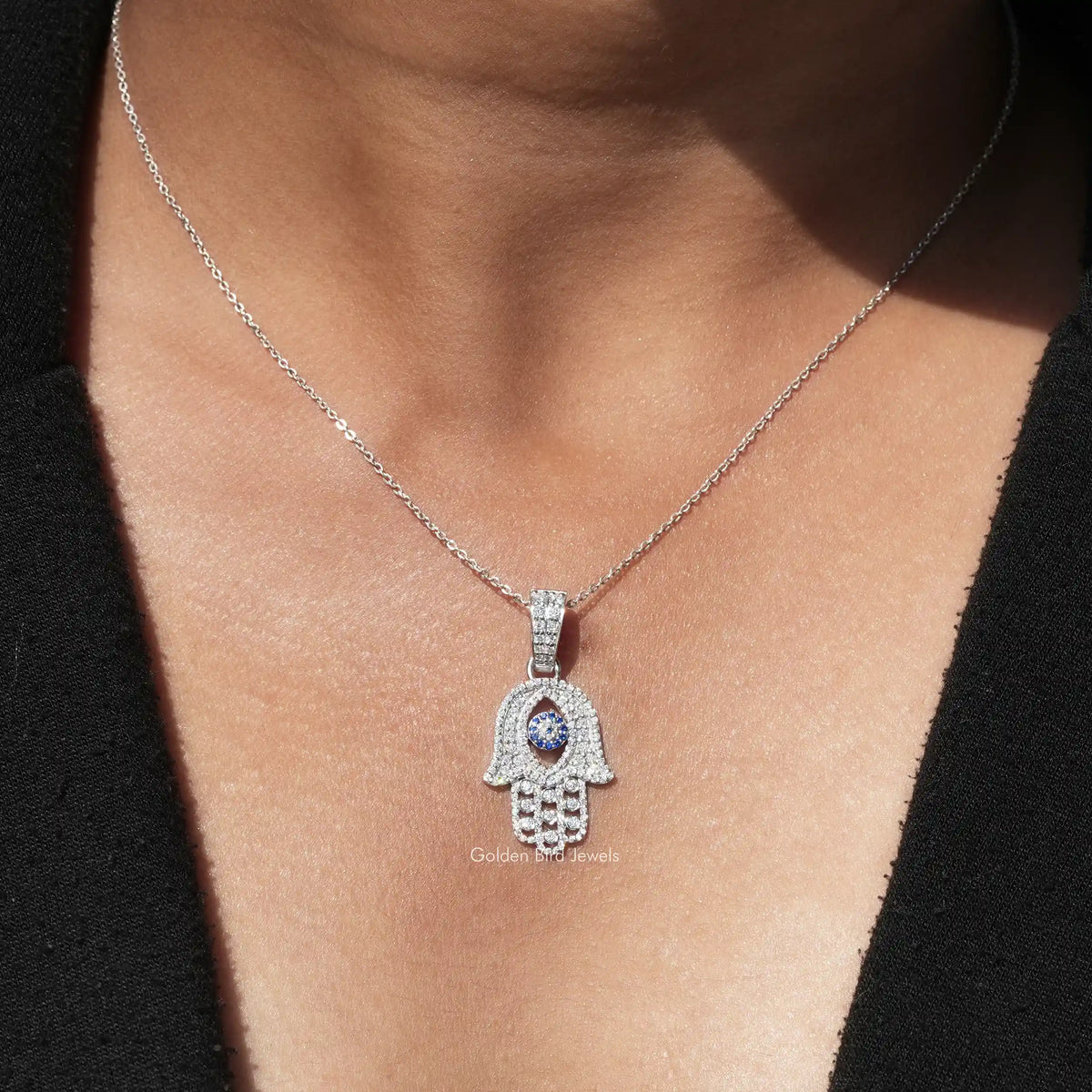 View of evil eye cut moissanite solitaire pendant 