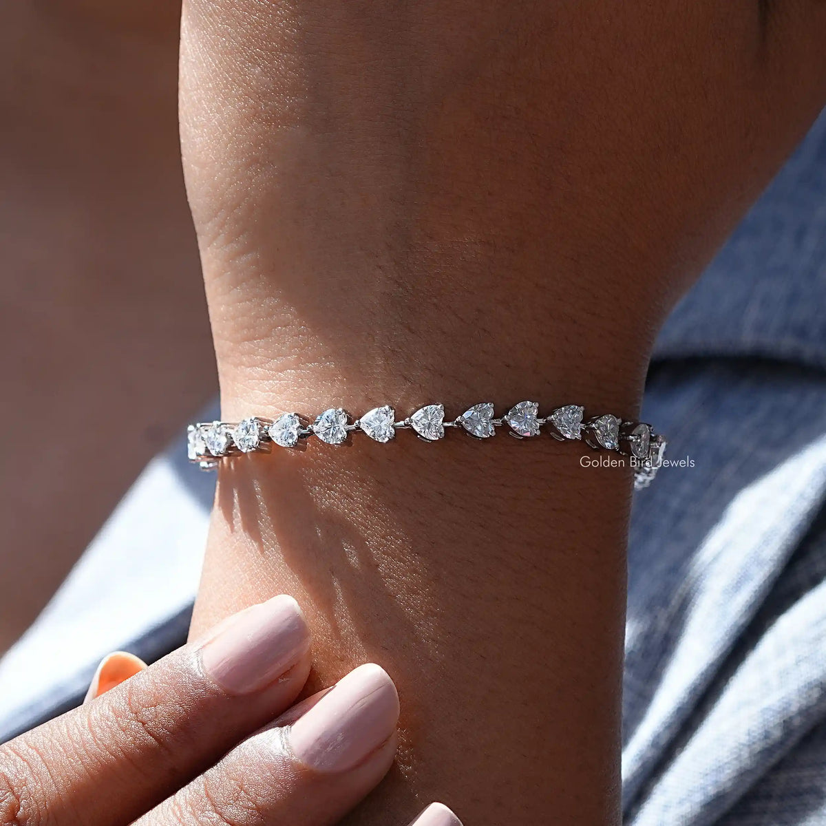 Side view of moissanite heart Cut Bracelet In white Gold
