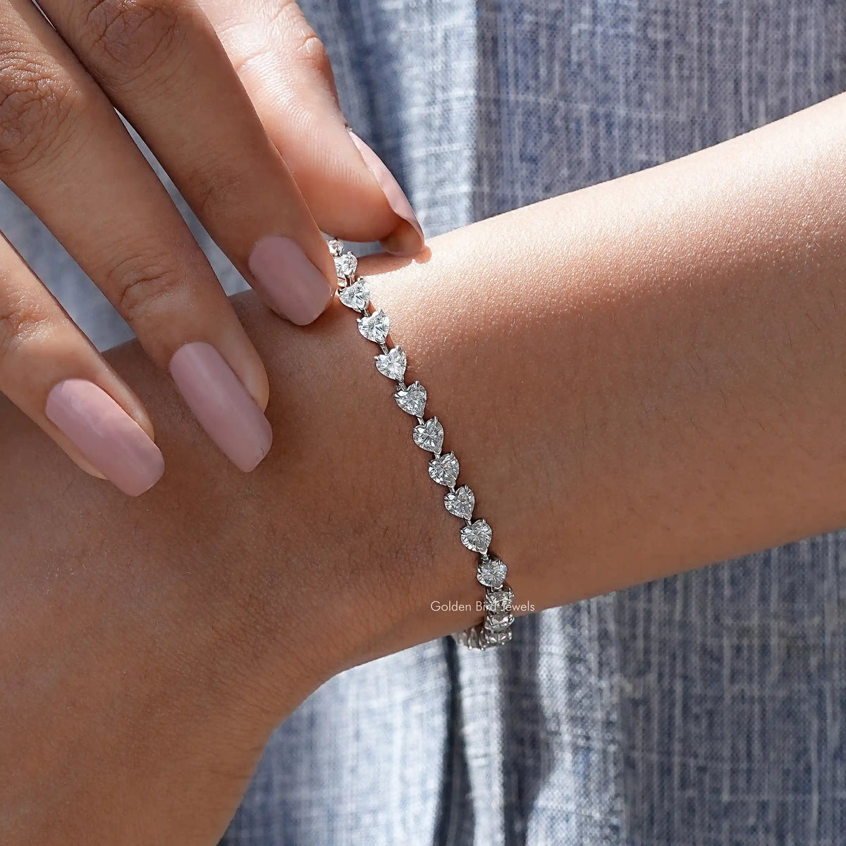 Detailed view of heart shaped moissanite bracelet
