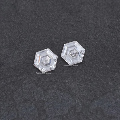 Loose pair of hexagon-cut moissanite stones, clear with faceted surfaces
