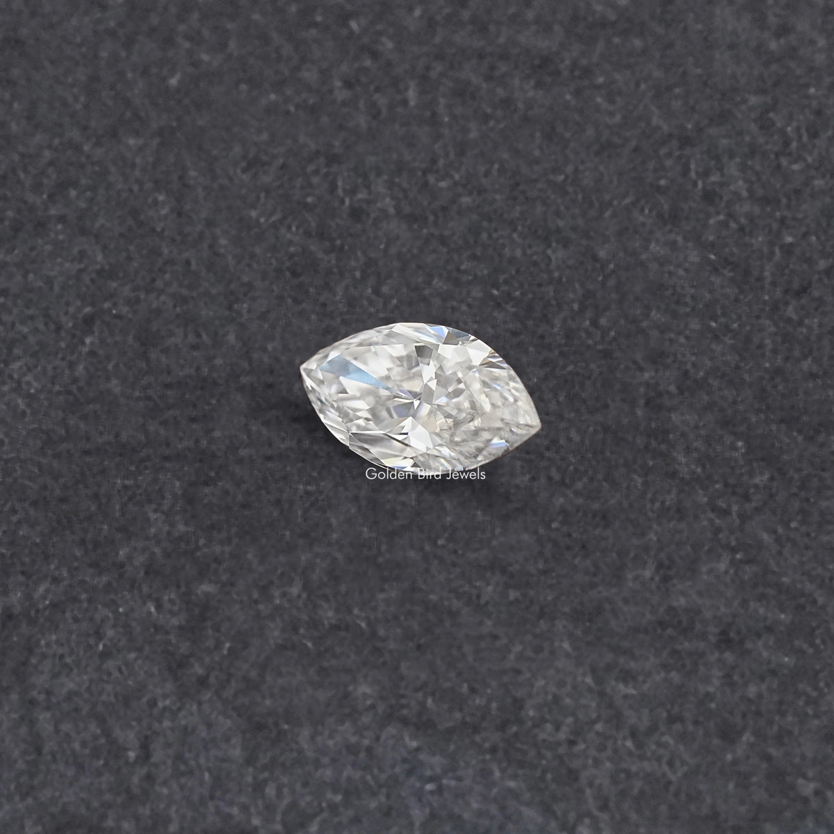 Marquise-cut moissanite loose stone, centered view with sparkling clear facets