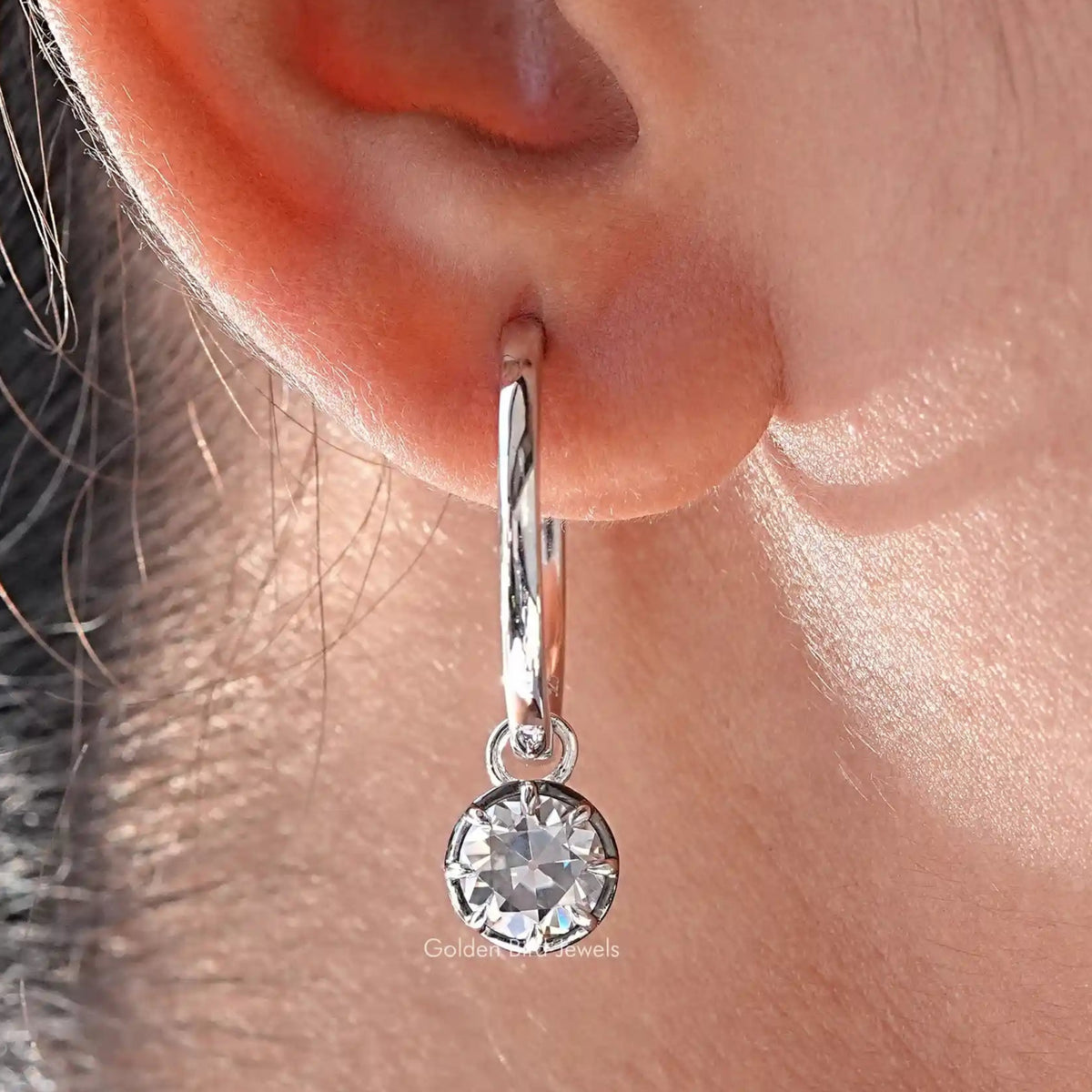 925 sterling silver hoop dangle earring with round moissanite drop, side view on ear
