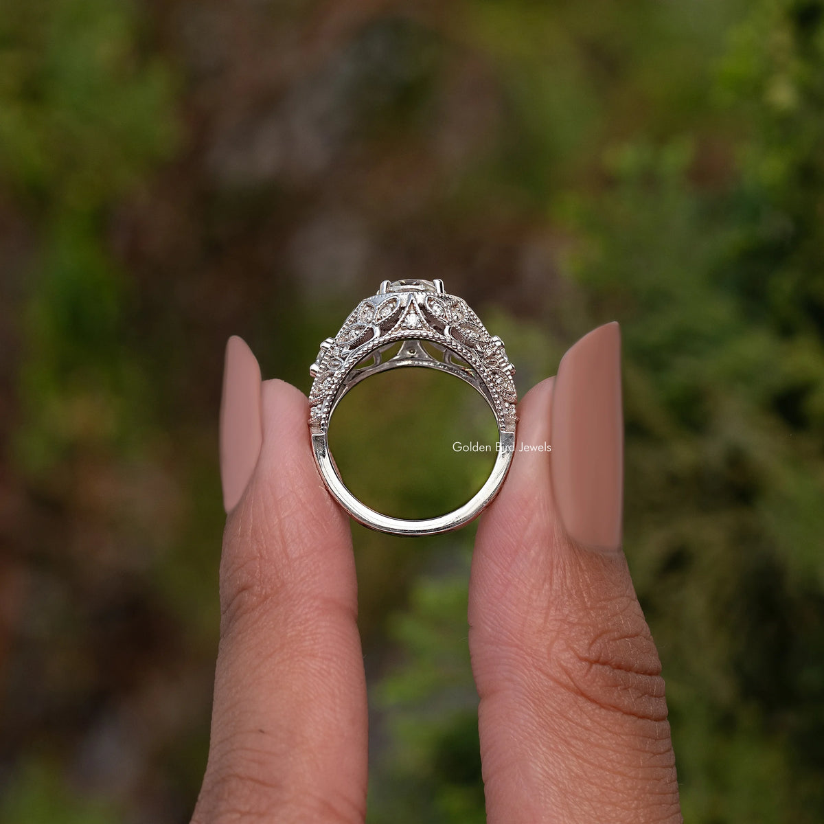 Sterling silver vintage moissanite ring, back view showing open band and prongs