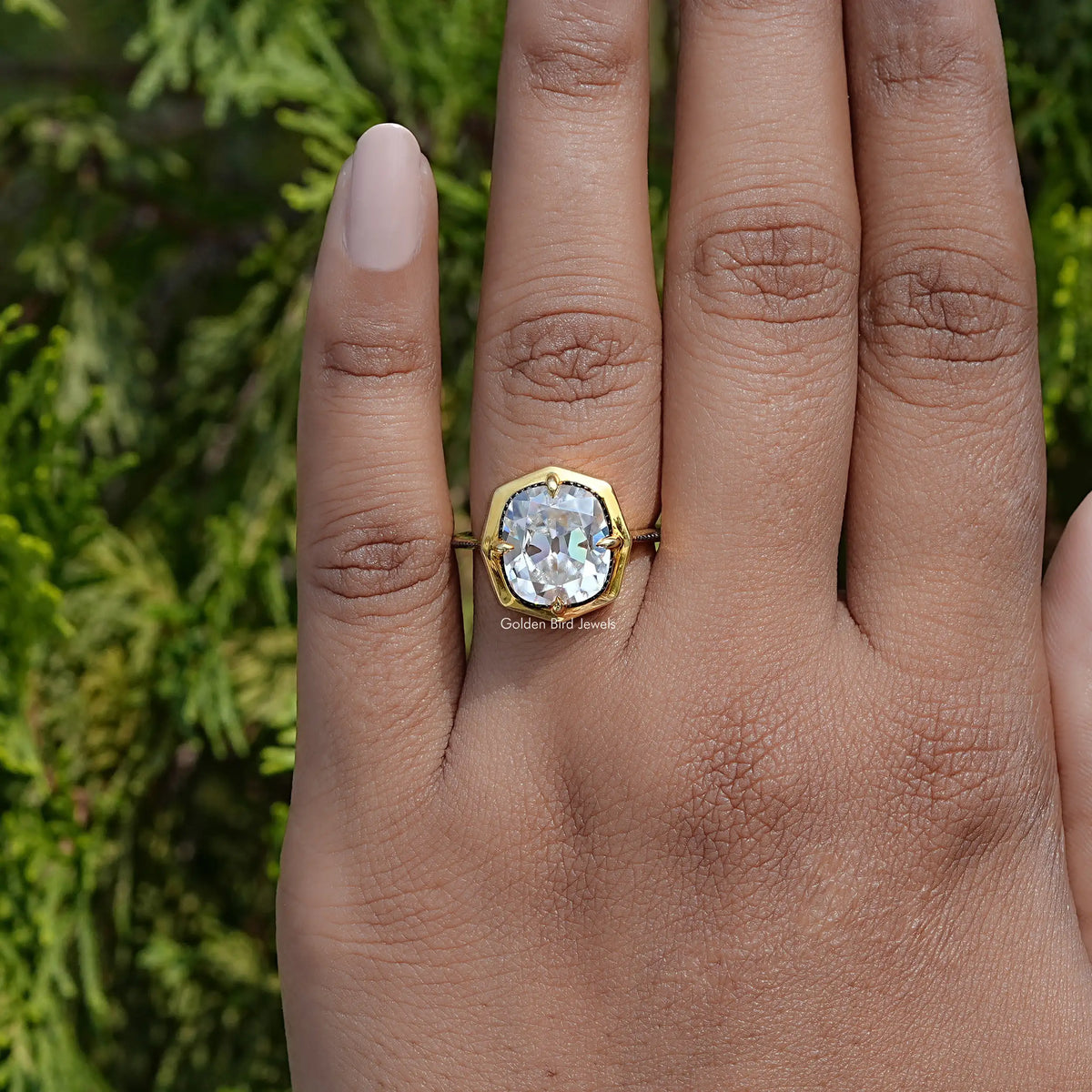 In Finger view of cushion cut moissanite halo Ring  
