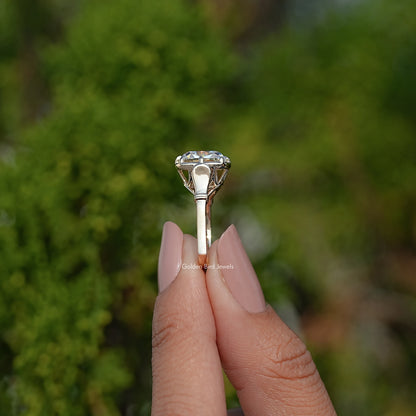 Gold cushion-cut moissanite solitaire ring with prong setting