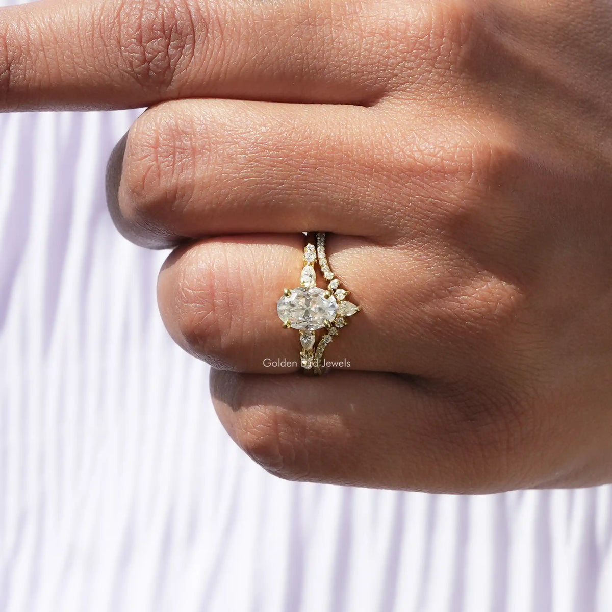 View of Oval Cut Moissanite Accent Stone Ring In finger