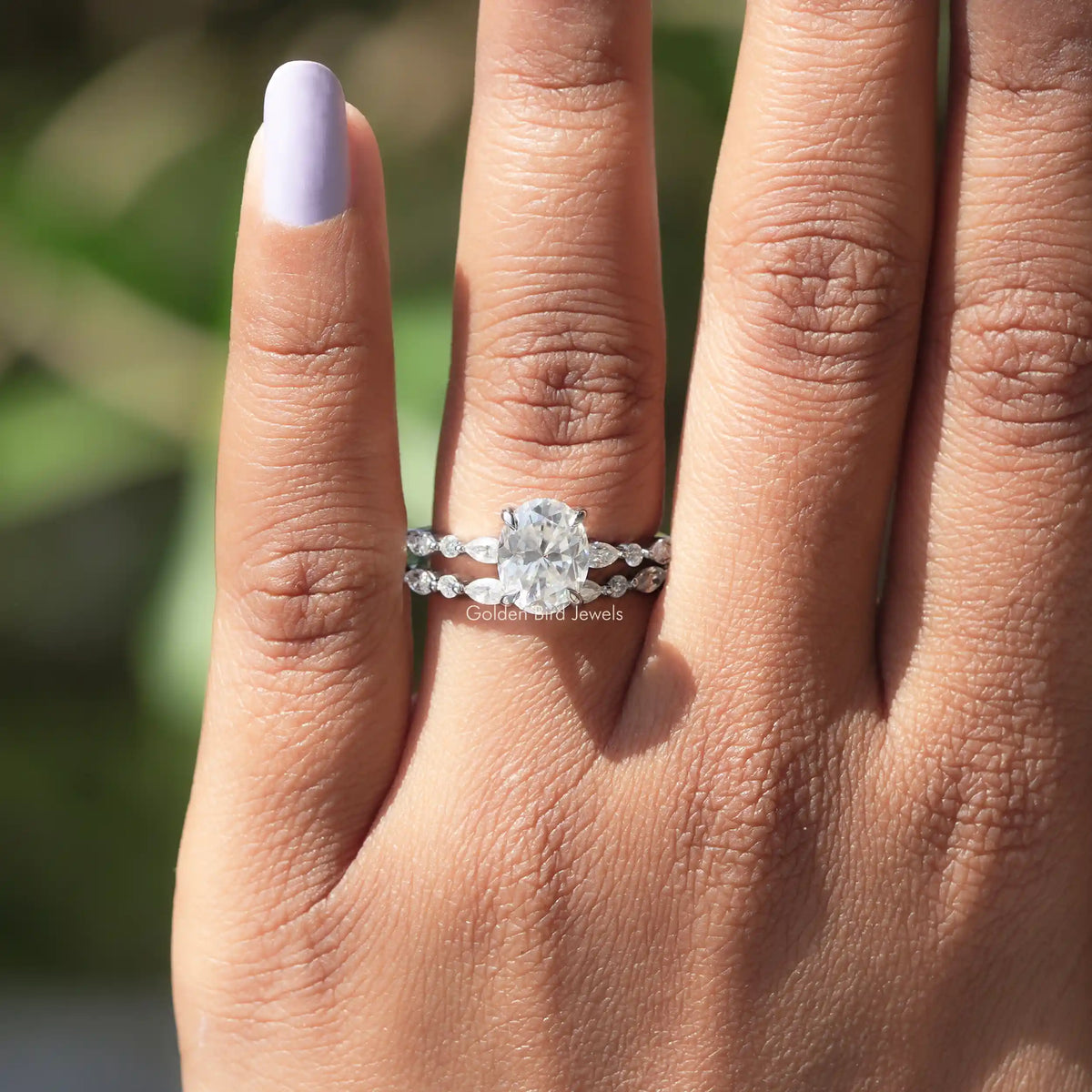Close-Up View of Oval Cut Moissanite Bridal Ring Set
In White Gold