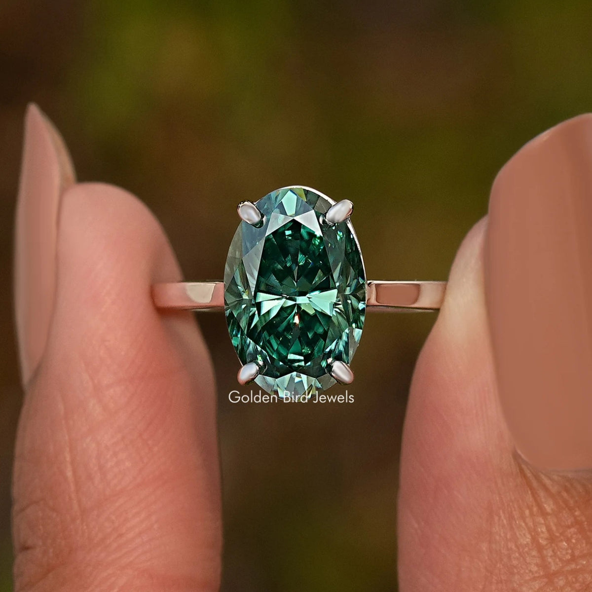 925 sterling silver oval-cut moissanite engagement ring with emerald green center stone