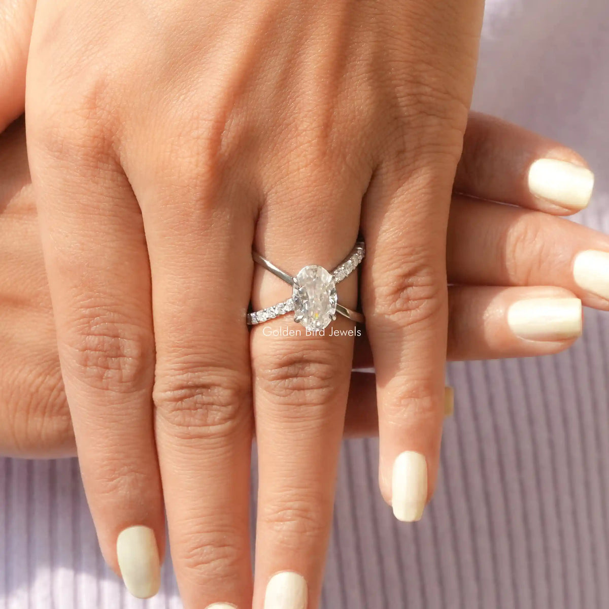 Close-Up View of Split Shank Oval Moissanite Ring In White Gold