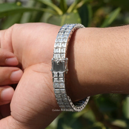 Men's moissanite tennis bracelet with rectangular center stone, silver setting