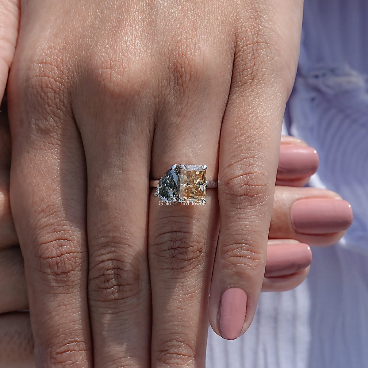 Detailed View Of Radiant And Pear Cut Moissanite Ring