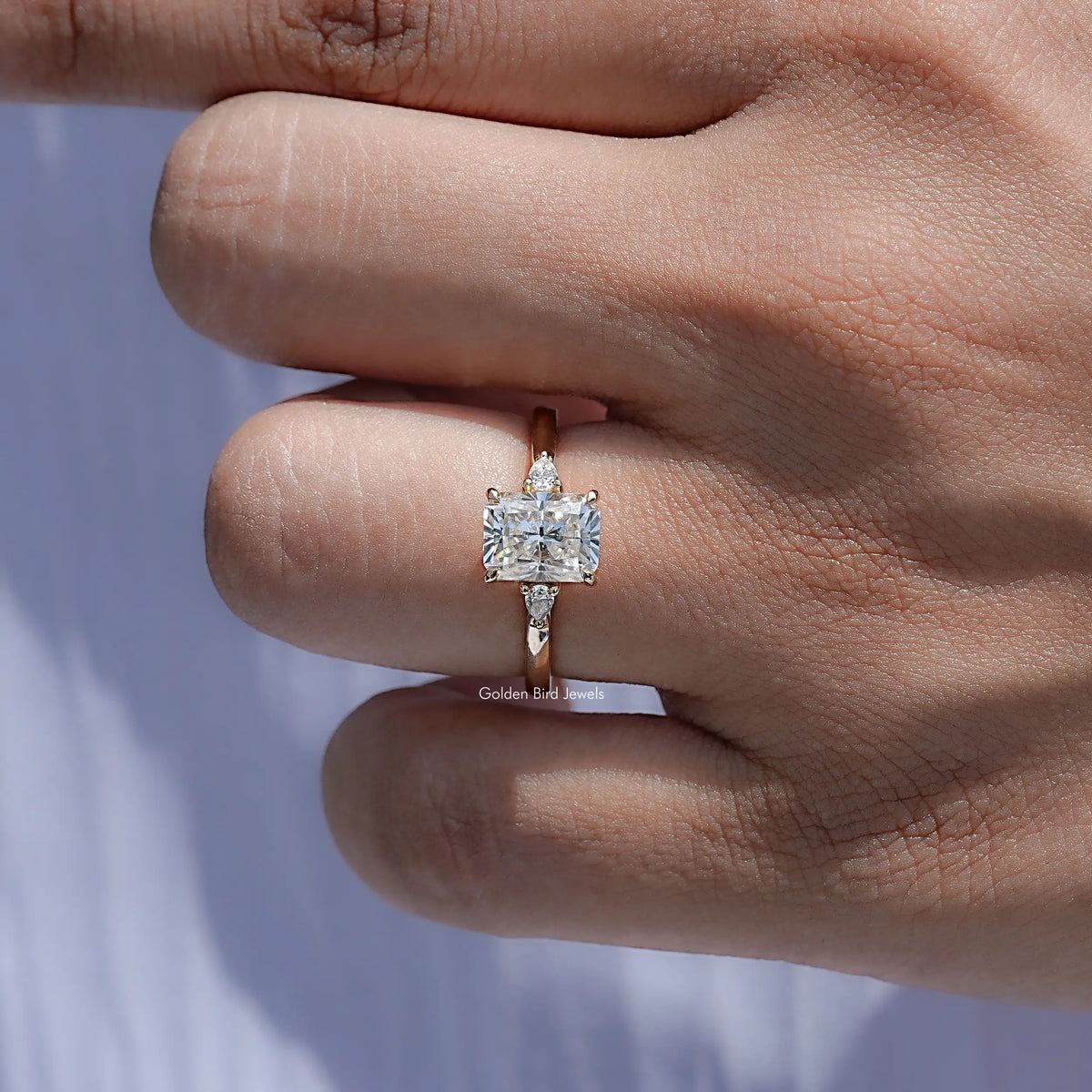 Close view of Radiant Cut Three Stone Engagement Ring