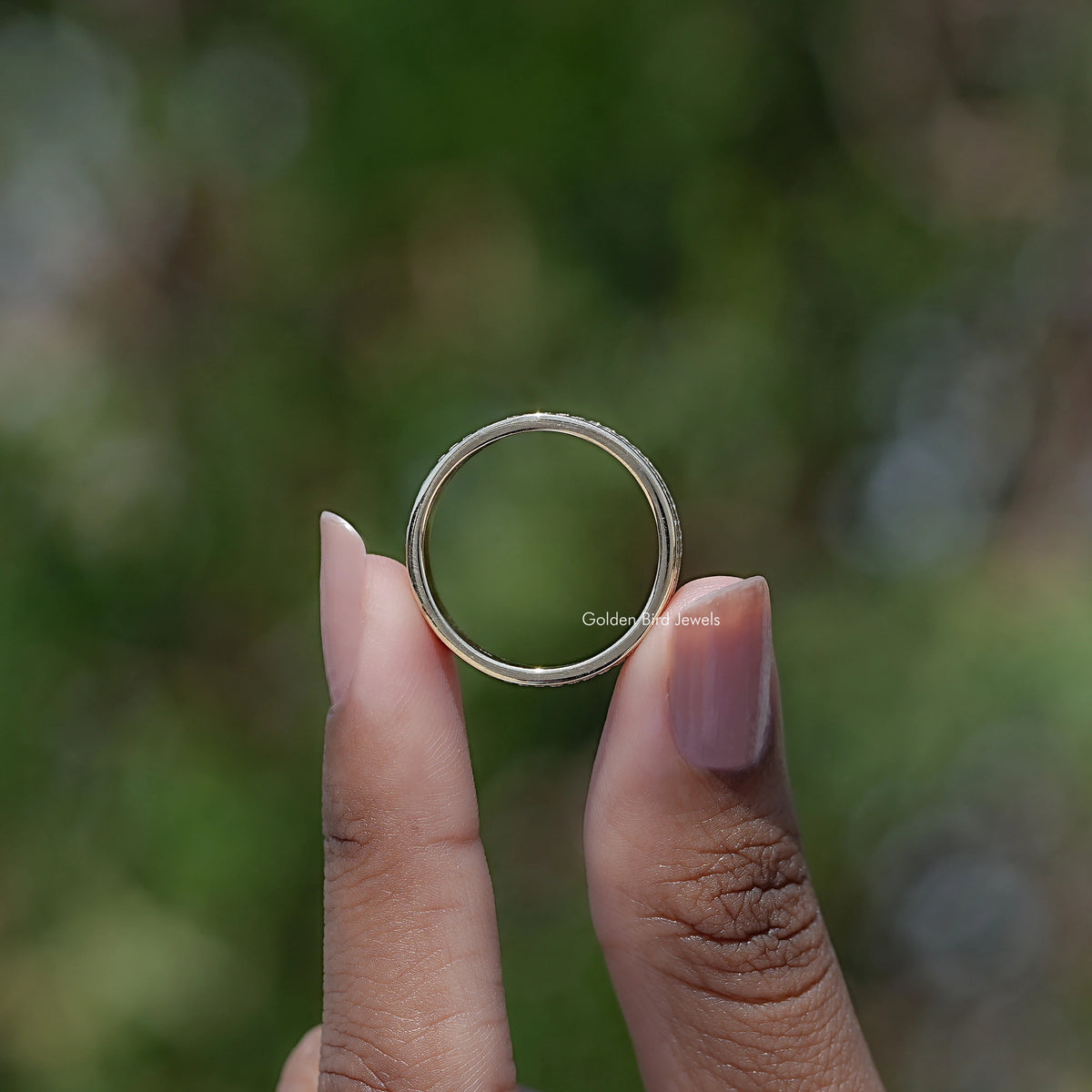Back view of Moissanite Round Cut Full Eternity Wedding Band Set in secure setting 