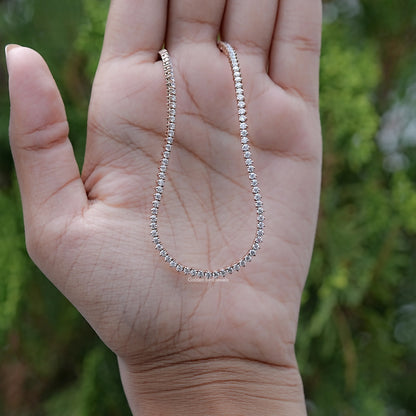 Close-Up of Round Moissanite Pendant in Secure Setting