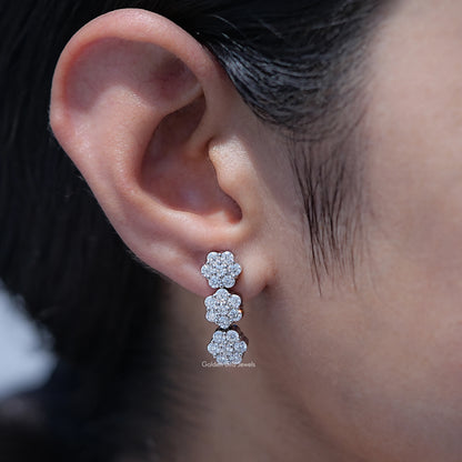 Two-tier flower cluster stud earrings with round stones, silver tone