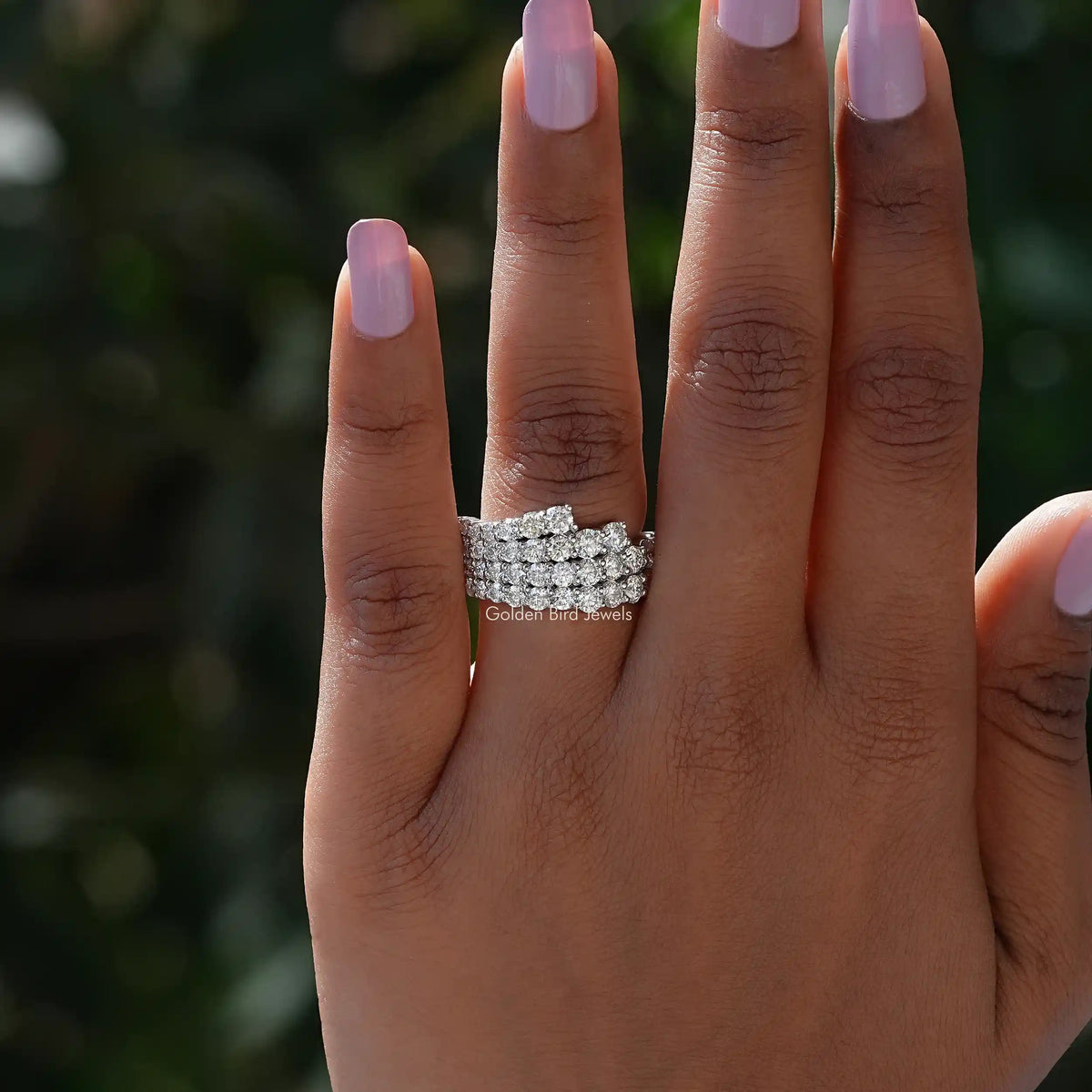 View of Round Cut Wedding Band In finger