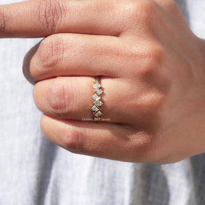 Silver-tone round eternity band ring with evenly spaced round prong-set stones