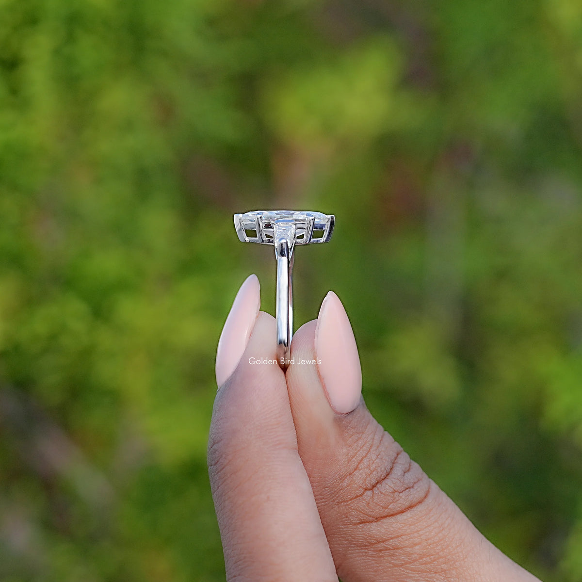 Side View Of Three Stone Marquise Moissanite Ring
