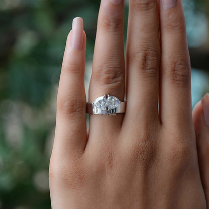 View of Trillion Cut Two Stone Engagement Ring In Finger