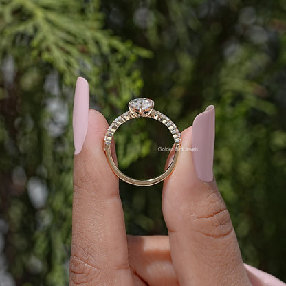 Moissanite ring back view with pronged center setting and gold-tone band