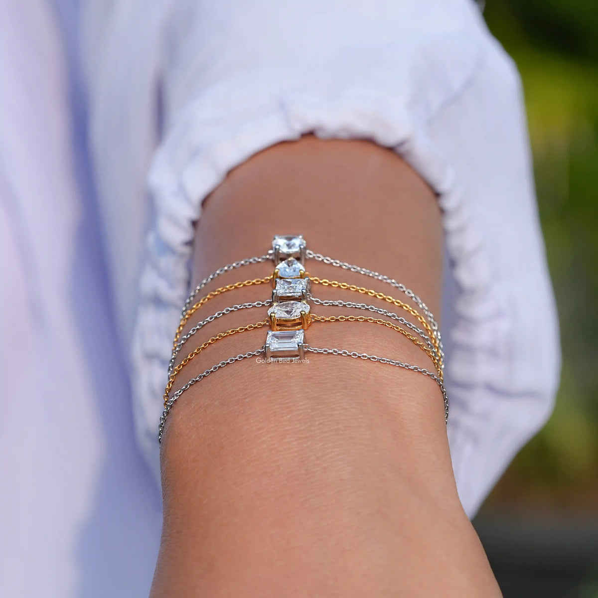 Silver-tone chain bracelet with rectangular and round moissanite stations