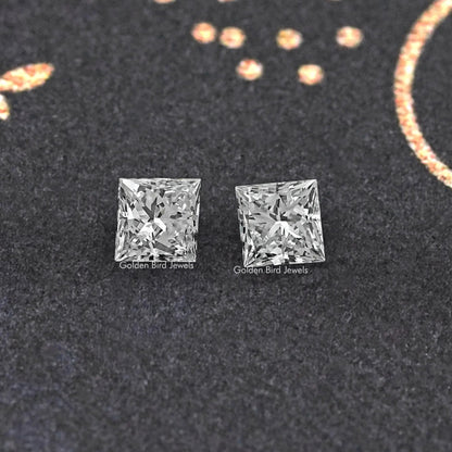Close-up pair of princess-cut lab-grown diamonds, square stones with crisp facets