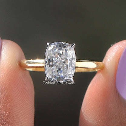 Yellow gold solitaire ring with elongated cushion-cut lab diamond and 4-prong setting